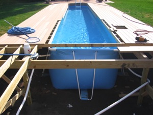 Pool - Liner full, deck work in process.JPG